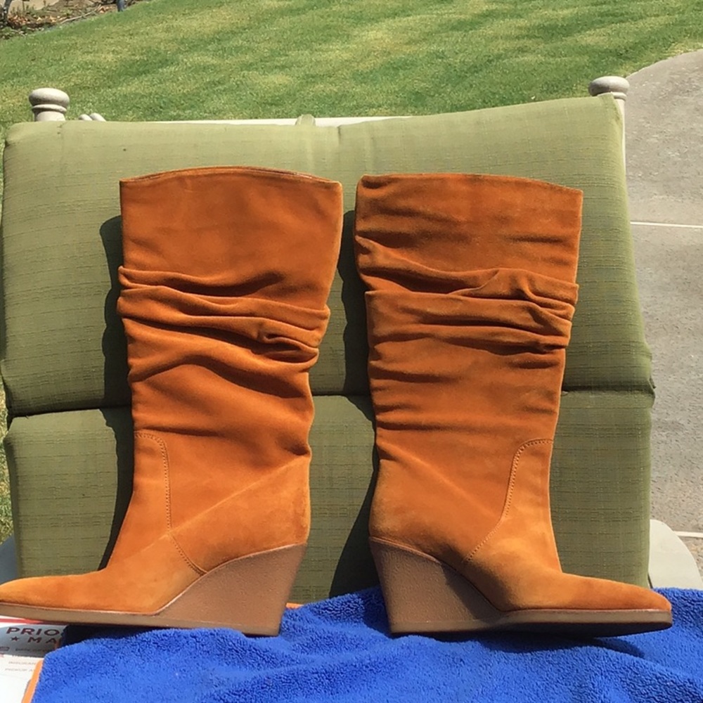 Salvatore Ferragamos Slouch Wedge knee high Boots